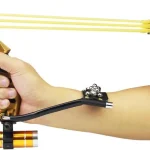 Handheld flashlight wristbow launcher